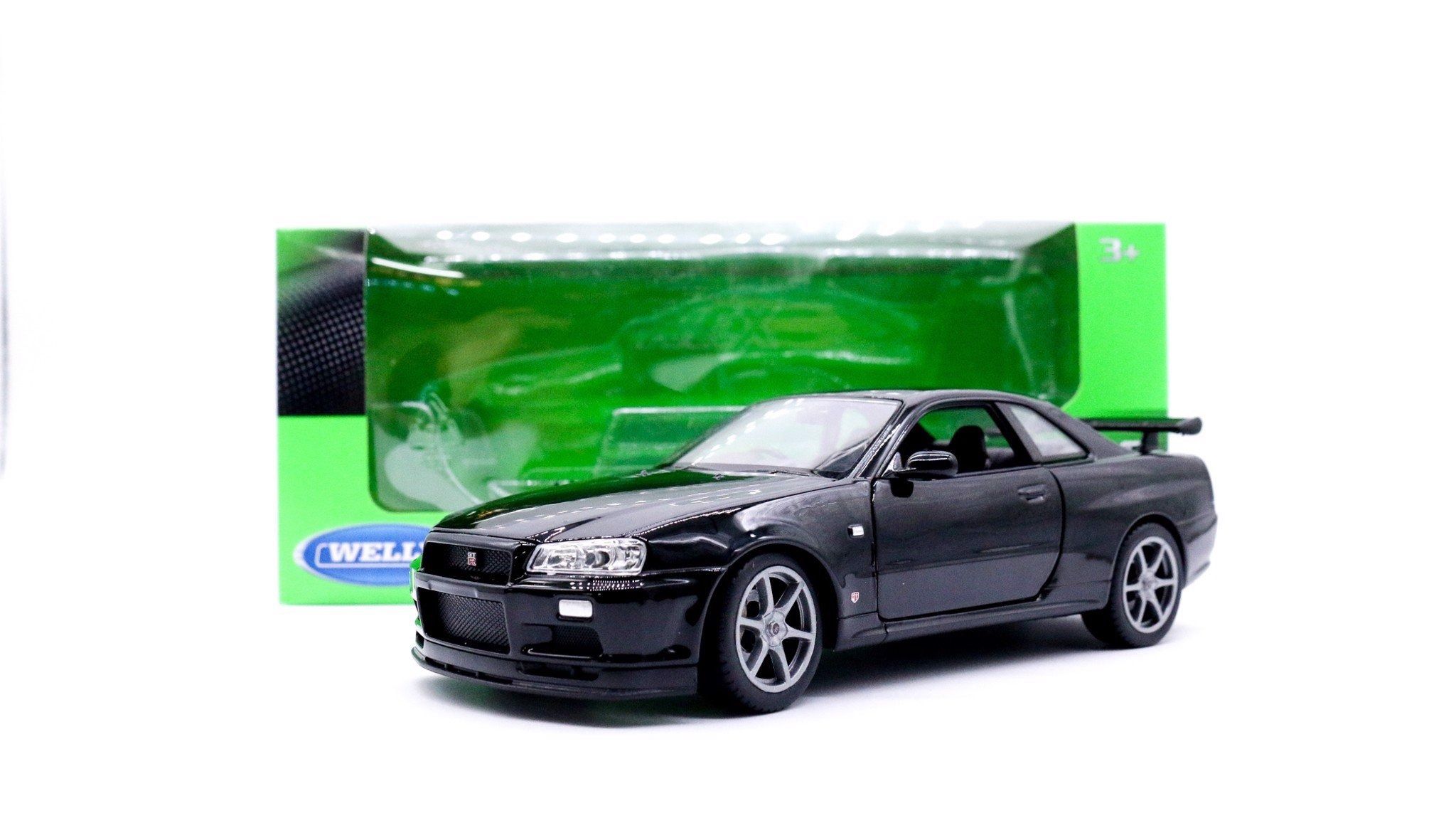  Mô hình xe Nissan Skyline Gt-R R34 1:24 Welly OT132 