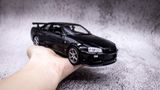  Mô hình xe Nissan Skyline Gt-R R34 1:24 Welly OT132 