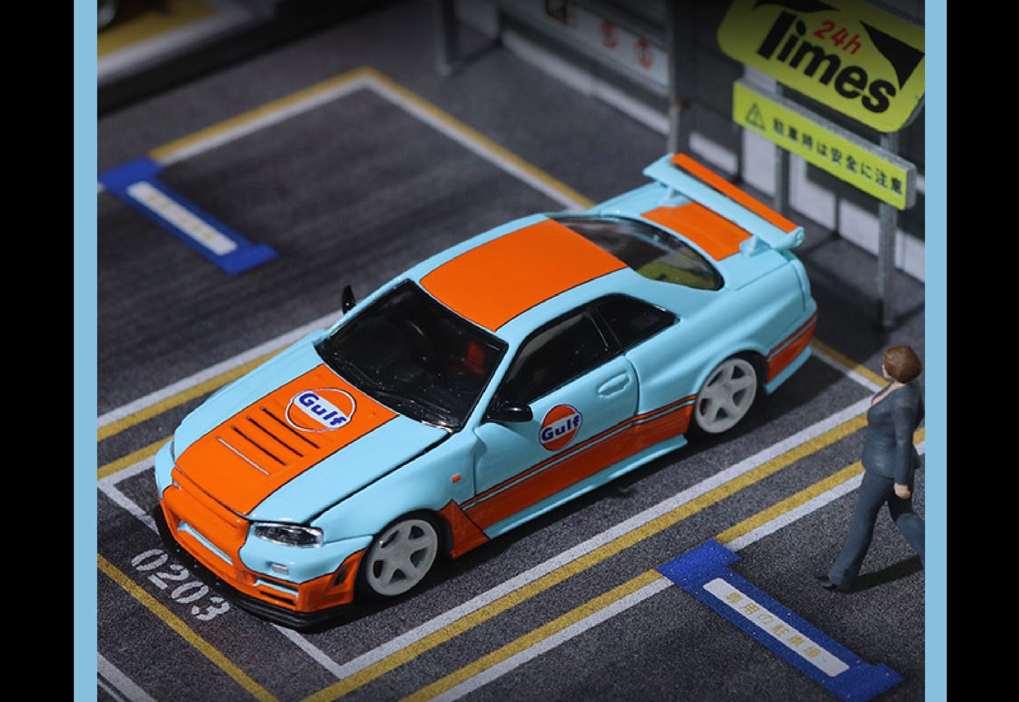  Mô hình xe ô tô Nissan GTR34 Gulf Limited Edition tỉ lệ 1:64 Time micro TM643414 