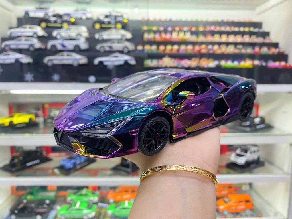 Mô hình xe Lamborghini Revuelto chrome color đánh lái được - full open - có đèn - âm thanh tỉ lệ 1:24 Alloy model OT24063