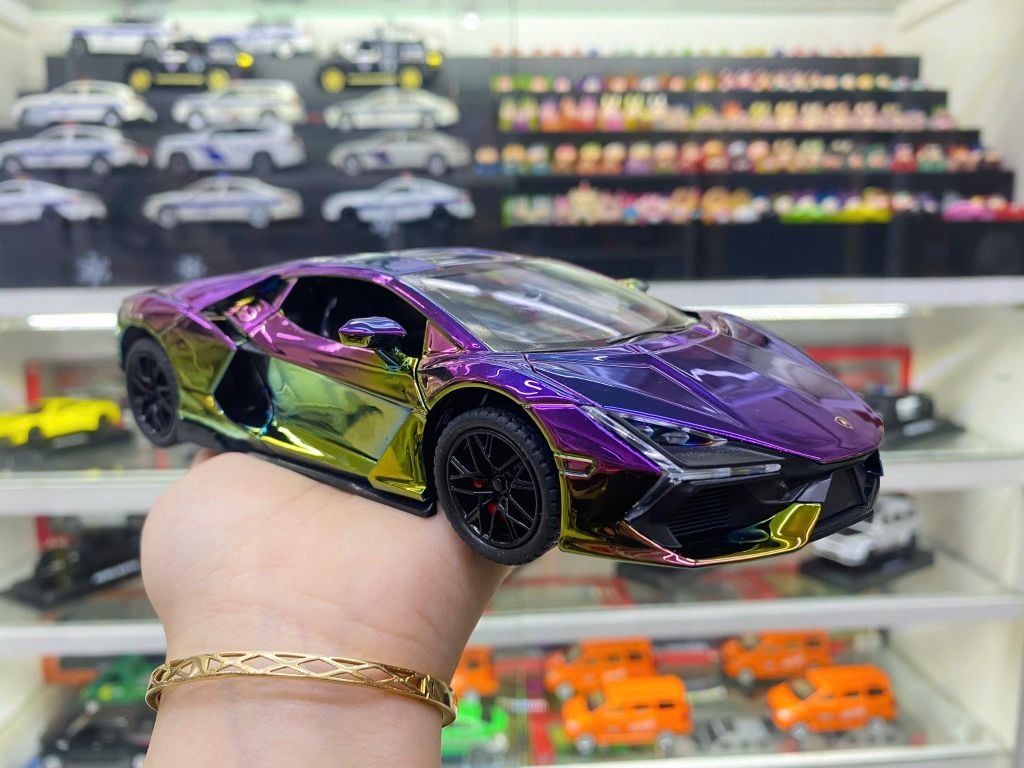 Mô hình xe Lamborghini Revuelto chrome color đánh lái được - full open - có đèn - âm thanh tỉ lệ 1:24 Alloy model OT24063