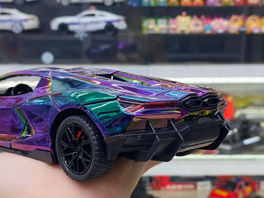Mô hình xe Lamborghini Revuelto chrome color đánh lái được - full open - có đèn - âm thanh tỉ lệ 1:24 Alloy model OT24063