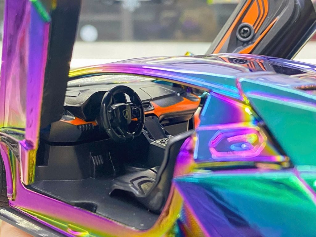 Mô hình xe Lamborghini Revuelto chrome color đánh lái được - full open - có đèn - âm thanh tỉ lệ 1:24 Alloy model OT24063