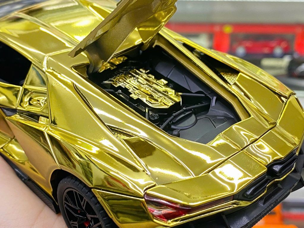 Mô hình xe Lamborghini Revuelto chrome color đánh lái được - full open - có đèn - âm thanh tỉ lệ 1:24 Alloy model OT24063