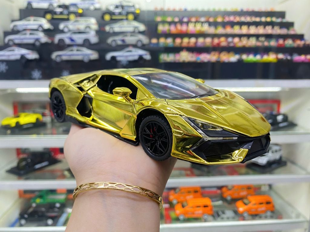 Mô hình xe Lamborghini Revuelto chrome color đánh lái được - full open - có đèn - âm thanh tỉ lệ 1:24 Alloy model OT24063