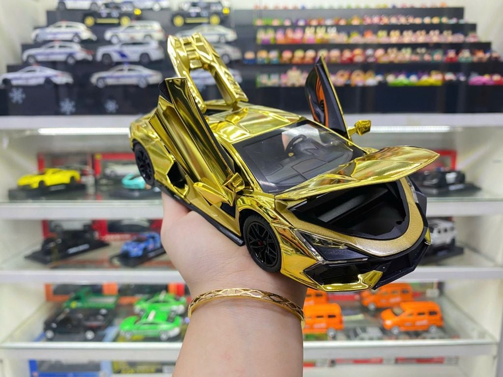 Mô hình xe Lamborghini Revuelto chrome color đánh lái được - full open - có đèn - âm thanh tỉ lệ 1:24 Alloy model OT24063