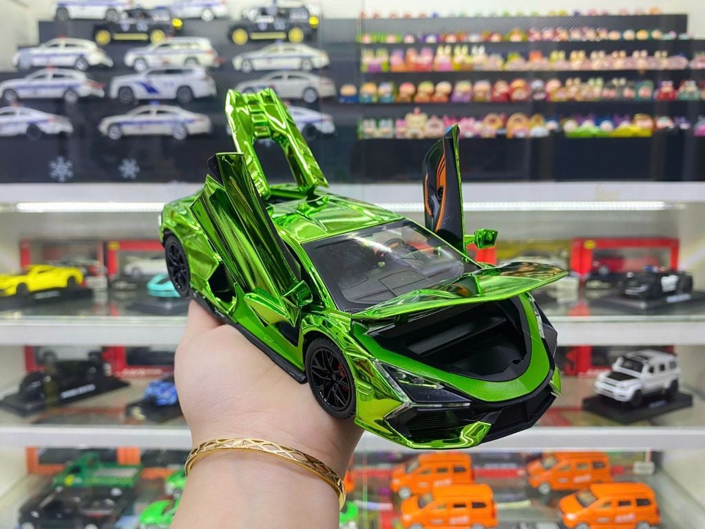 Mô hình xe Lamborghini Revuelto chrome color đánh lái được - full open - có đèn - âm thanh tỉ lệ 1:24 Alloy model OT24063