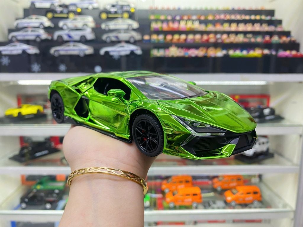 Mô hình xe Lamborghini Revuelto chrome color đánh lái được - full open - có đèn - âm thanh tỉ lệ 1:24 Alloy model OT24063