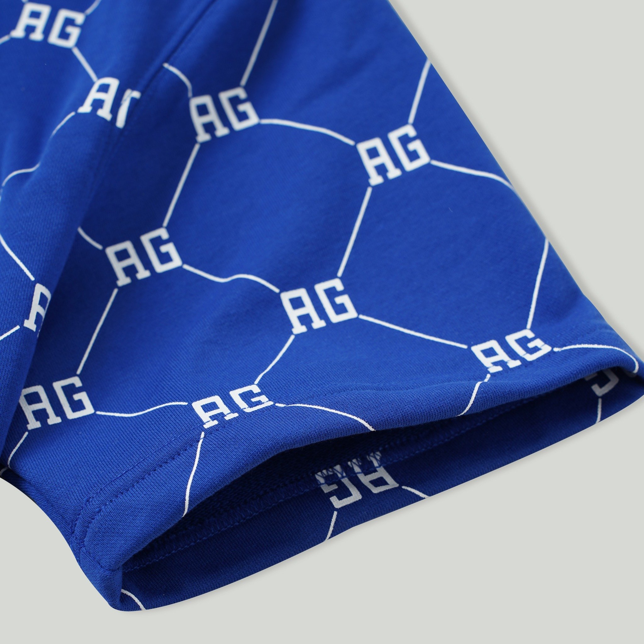 AG64 STUDIO OVERSIZE MONOGRAM PRINTED HOODIE - BLUE