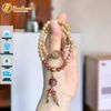 Vòng tay hạt trầm hương banh lào hoa sen mix cỏ 4 lá thạch anh tóc đỏ hợp mệnh may mắn - Tuệ Lâm