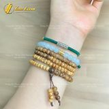  Vòng tay Tibet bện chỉ ngũ sắc - xanh rêu mix charm Om Mani Padme Hum bình an - may mắn 