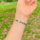  Vòng tay hạt lam ngọc 6 li mix cỏ 4 lá và ống trụ charm vàng 10k may mắn bình an 