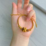  Vòng tay cỏ 4 lá đá mắt hổ nâu vàng hợp mệnh kim thổ bện chỉ handmade may mắn bình an 