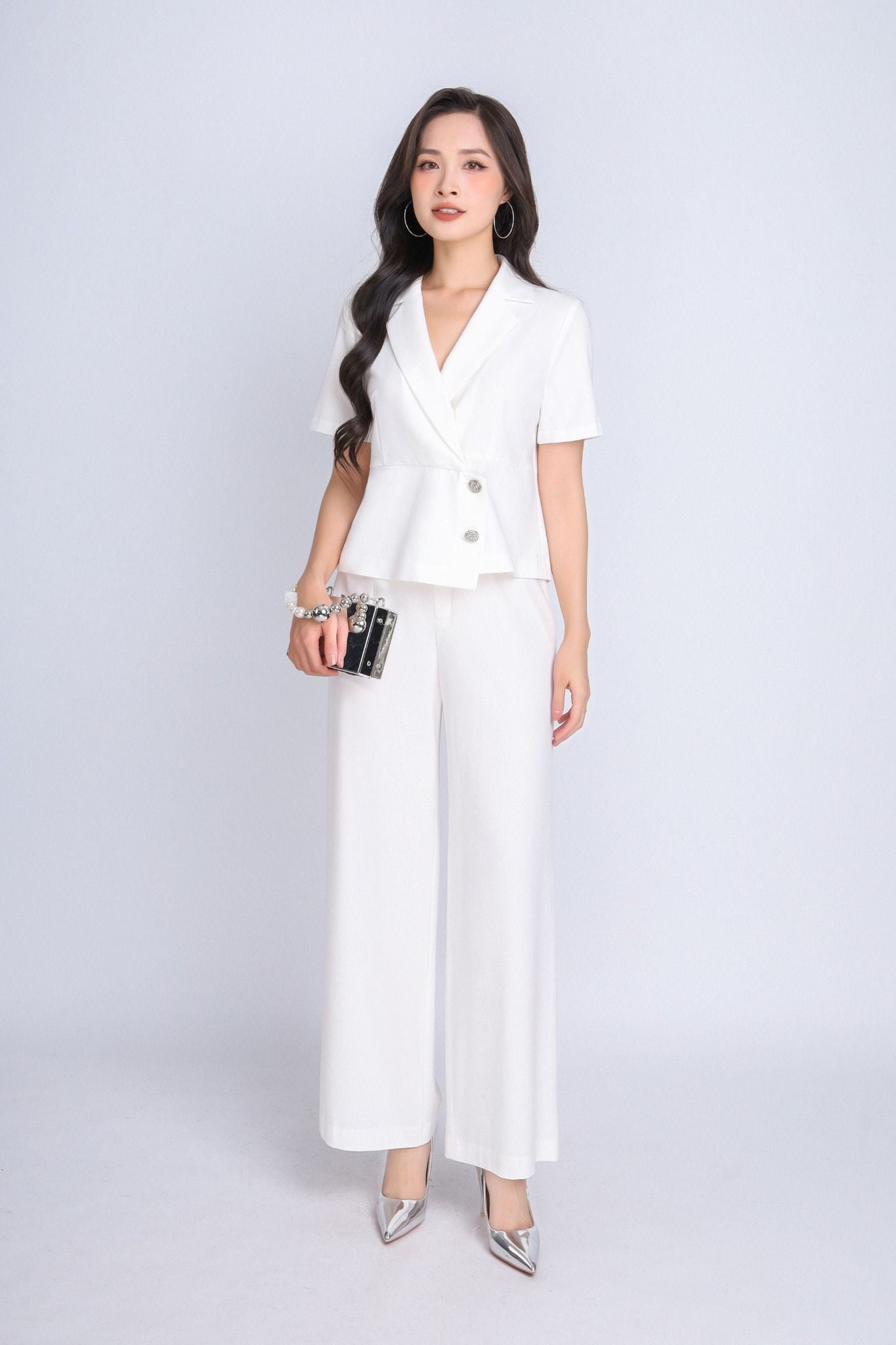 BAK33086 - Áo vest kiểu công sở chất liệu tuytsi dáng peplum lửng, vạt chéo đính khuy trang trí - PANTIO