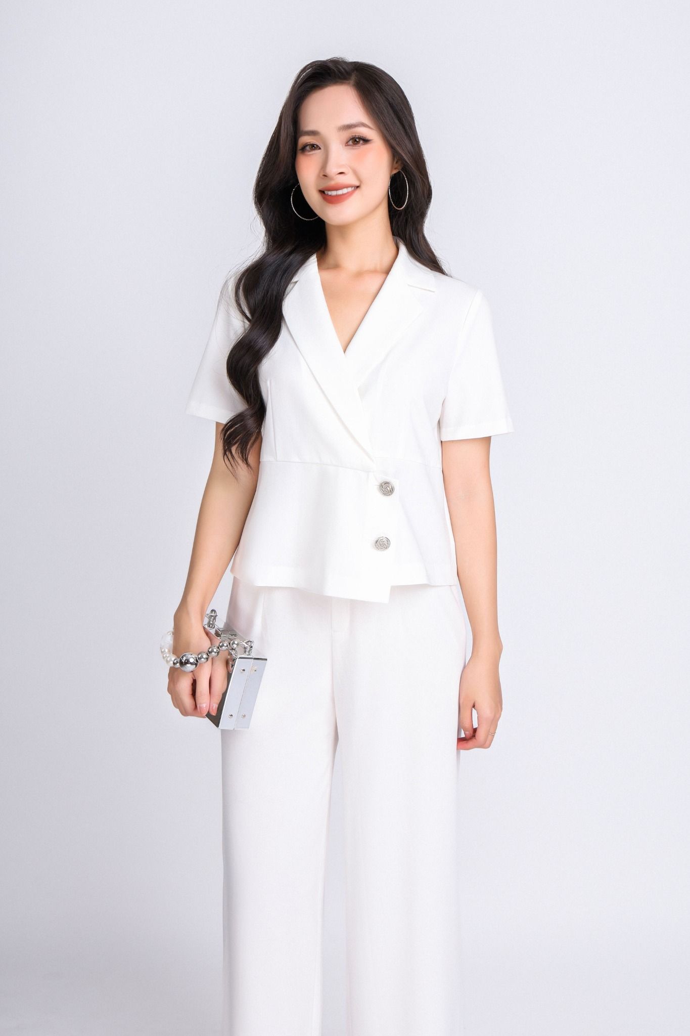 BAK33086 - Áo vest kiểu công sở chất liệu tuytsi dáng peplum lửng, vạt chéo đính khuy trang trí - PANTIO
