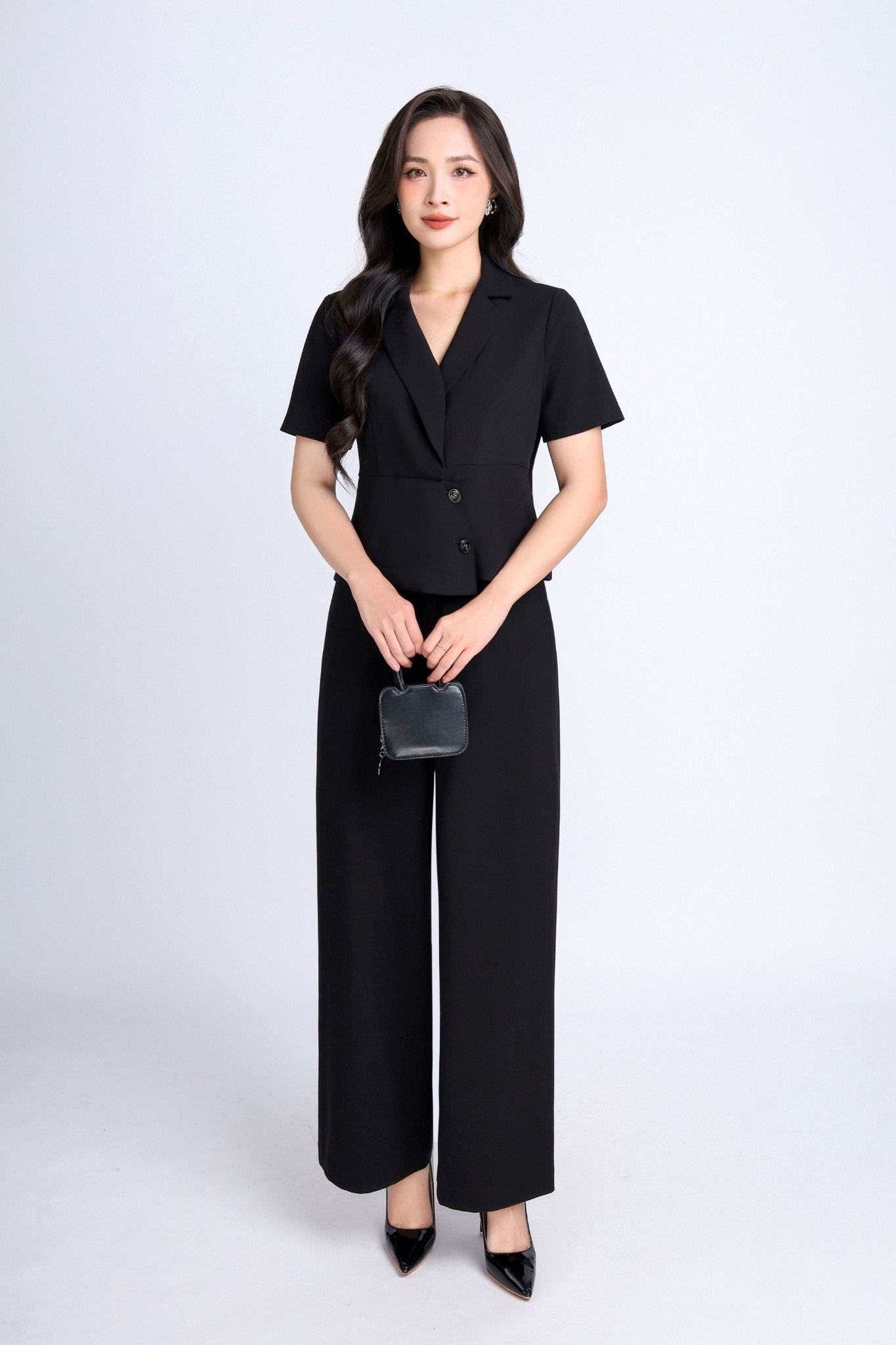 BAK33086 - Áo vest kiểu công sở chất liệu tuytsi dáng peplum lửng, vạt chéo đính khuy trang trí - PANTIO