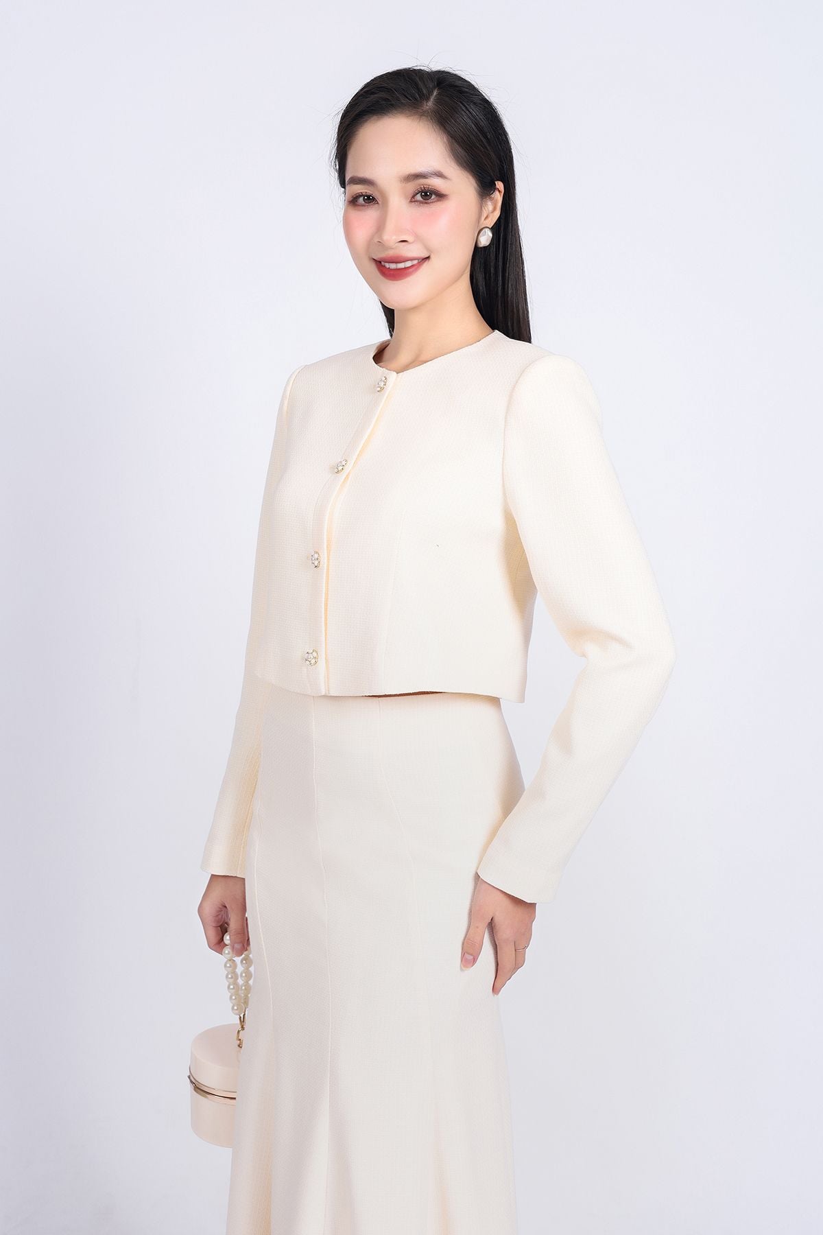 BKM93208 - tylekeo8888 công sở vải dạ dáng lửng cổ tròn tay bồng nhẹ cài khuy đá thân trước - tỷ lệ kèo 8899