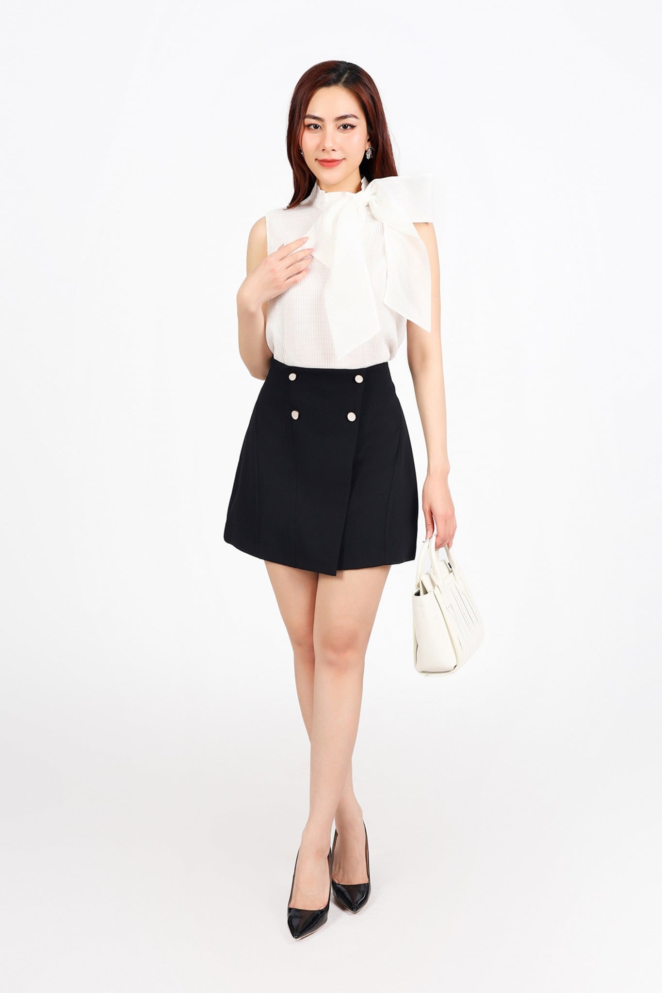 FJN1703 - Chân váy ngắn vải thô dày dáng A có lót thân váy đính khuy phối vạt lệch tạo kiểu - PANTIO