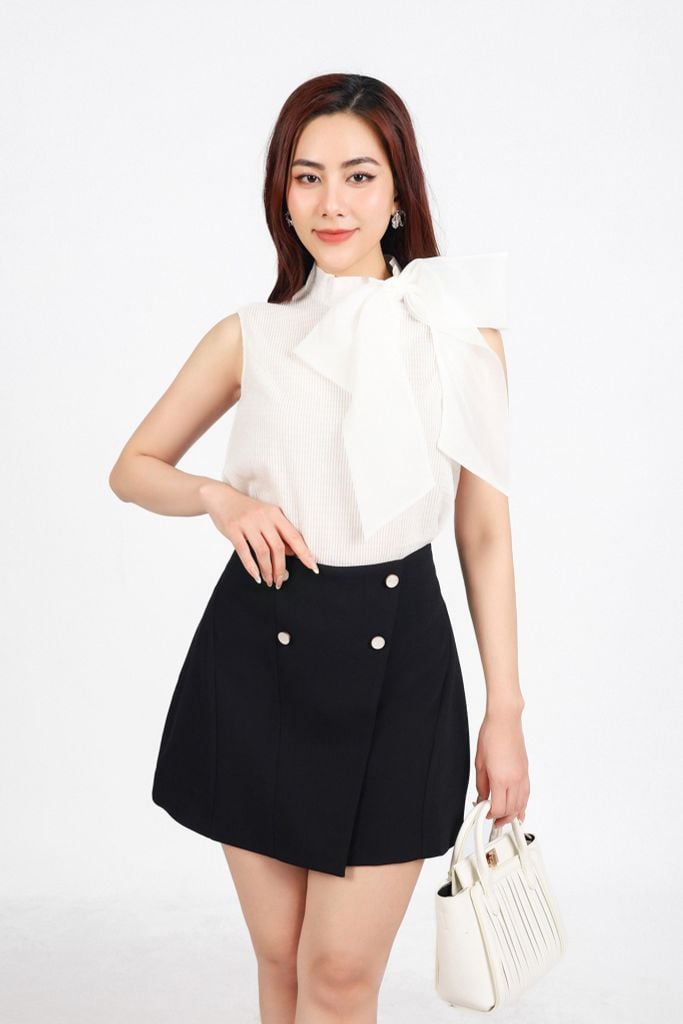 FJN1703 - Chân váy ngắn vải thô dày dáng A có lót thân váy đính khuy phối vạt lệch tạo kiểu - PANTIO