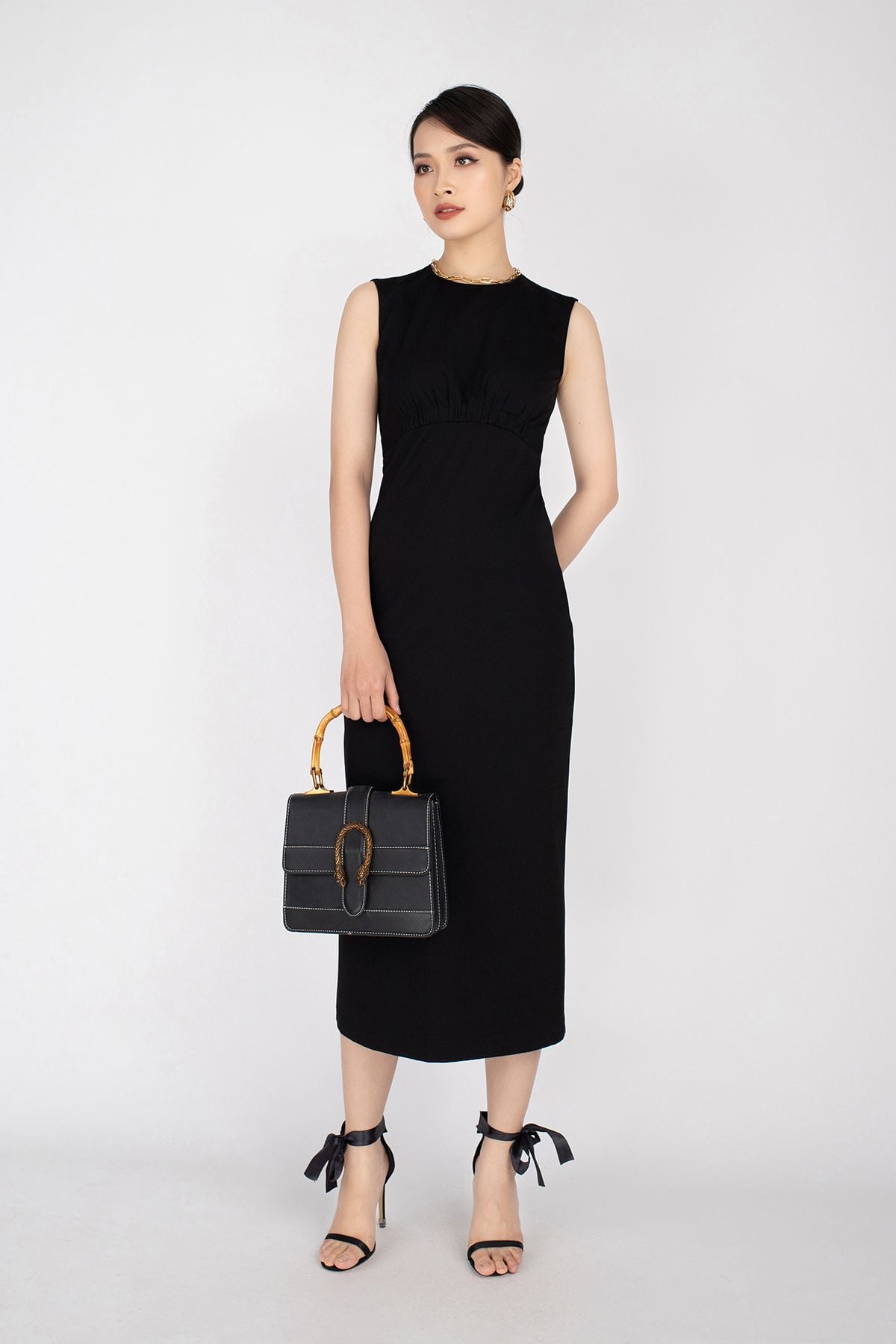 Đầm công sở chất liệu cotton cổ tròn sát nách dáng ôm FDC93278 - PANTIO