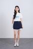 FQN3390 - Chân váy ngắn dáng suông vạt lệch phối khuy kim loại tạo kiểu - JAN.