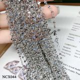  NCX044 Dây chuyền hoa dập giữa nhỏ 