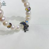  PE004 Vòng ngọc trai phối charm dreamcatcher 