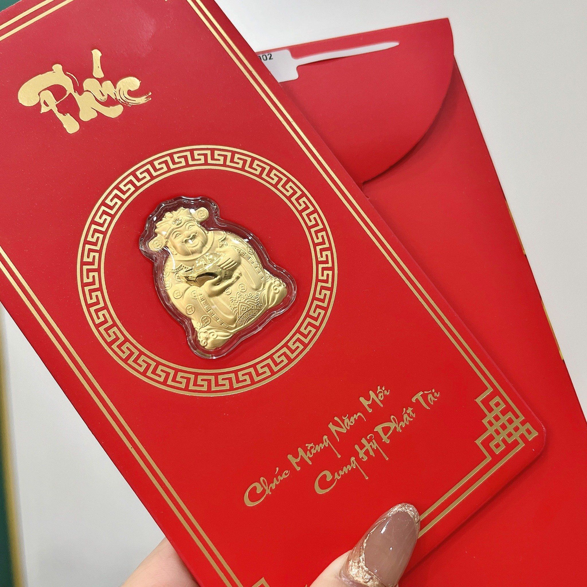  PKG002 Bao lì xì thần tài vàng 999 