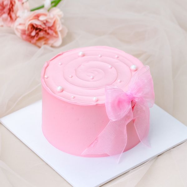BÁNH KEM NƠ MÀU HỒNG