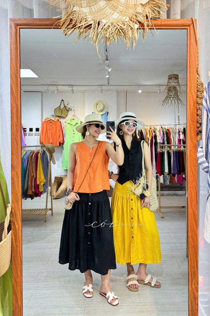 Chân váy nút dừa lưng thun linen tưng premium Cói Design