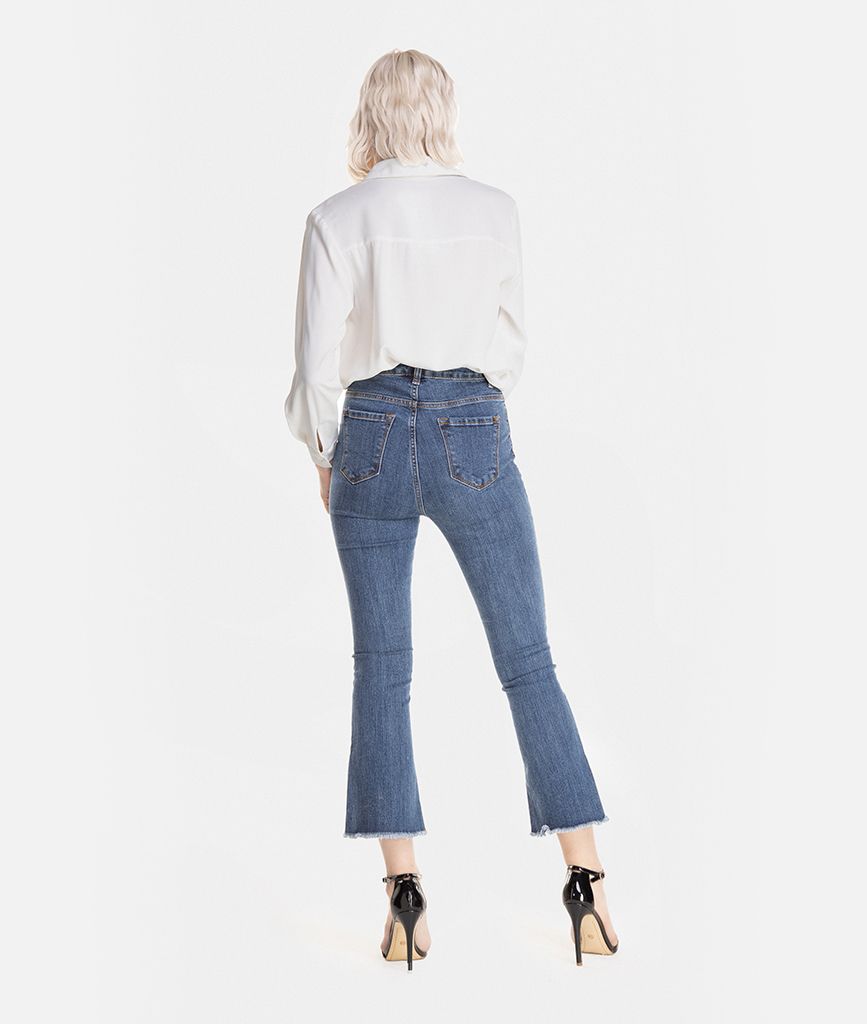 Quần denim dài lai xéo