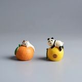  Tượng Mèo Nằm Trên Quả Cam 