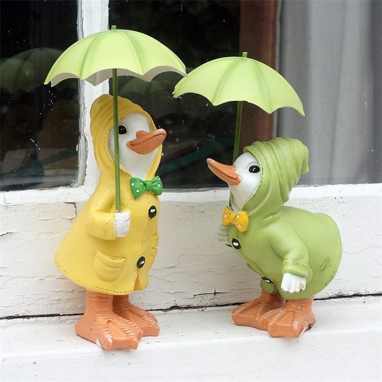  Tượng Vịt Cầm Ô 
