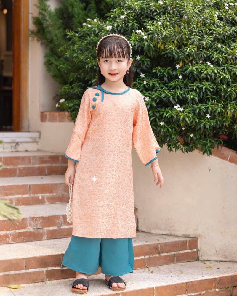 Áo dài bé gái gấm nơ