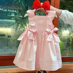 Đầm bé gái nơ eo kèm cài