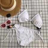  2BN81 - set bikini trắng xoắn ngực 