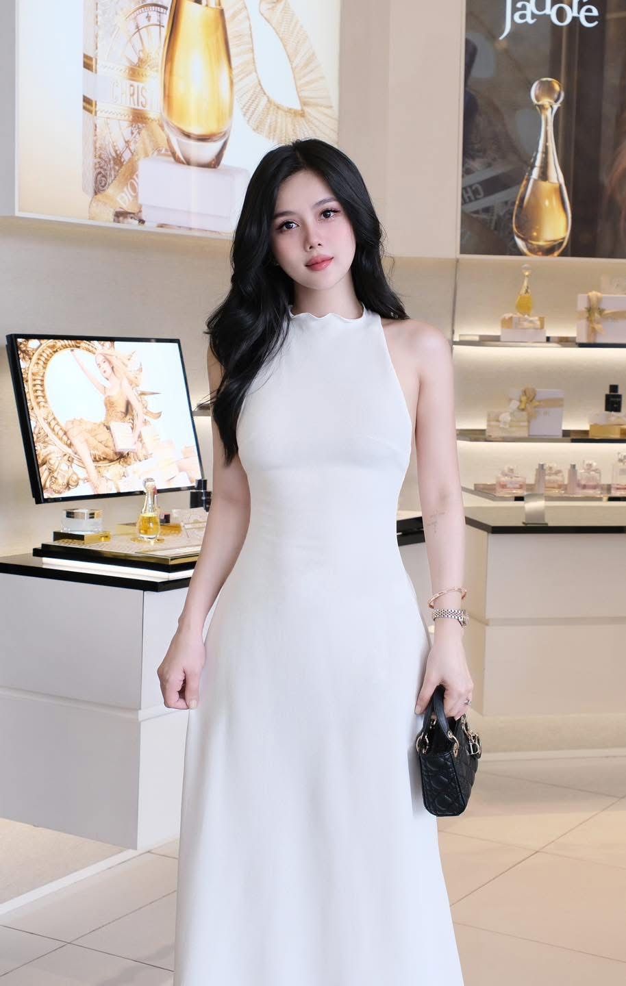 Đầm Thun Xoắn Hở Lưng