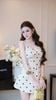 Đầm Trơn Kèm Charm Nơ Sau