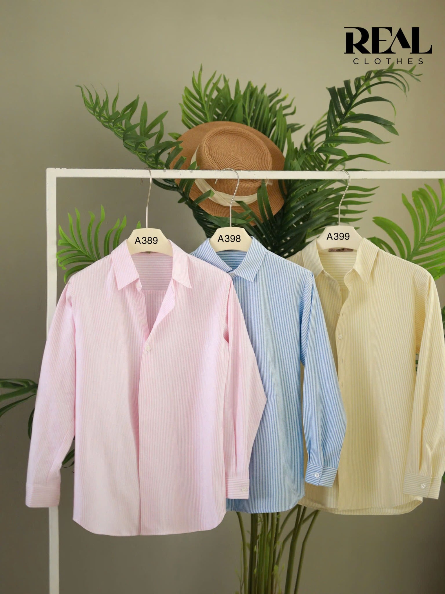 Sơ mi form rộng sọc hồng SALE