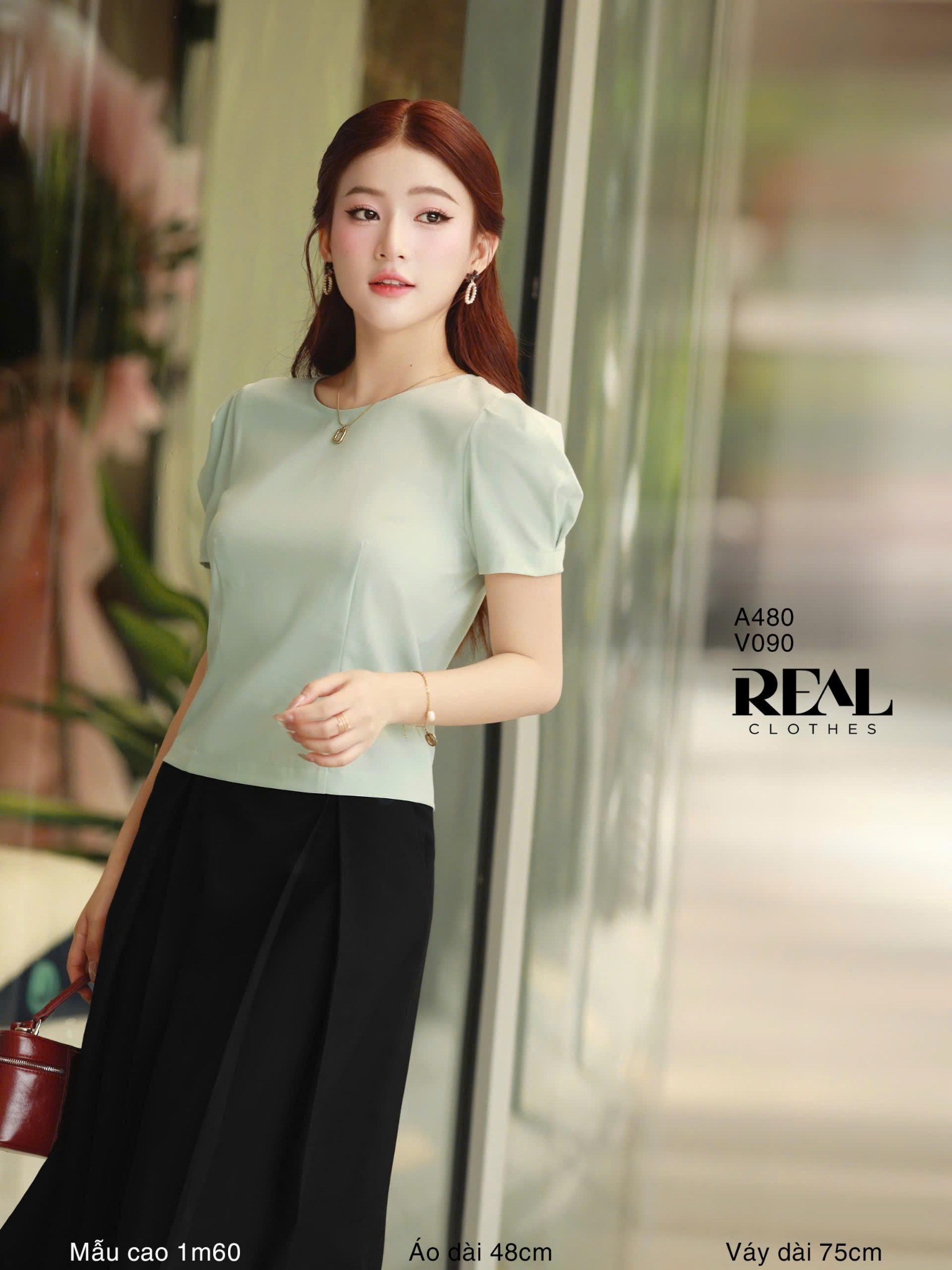 Váy 2 xếp nút đen SALE