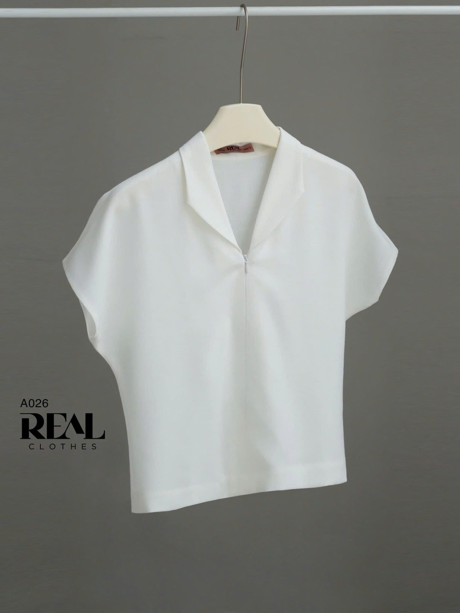 Áo cánh dơi linen trắng