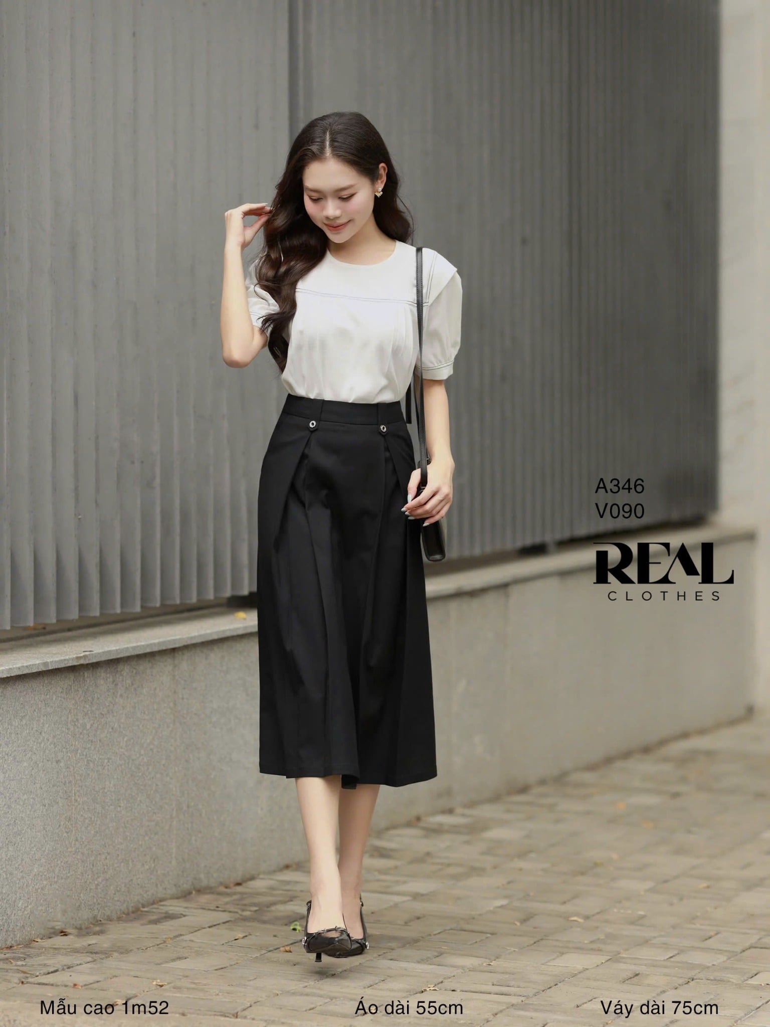 Váy 2 xếp nút đen SALE