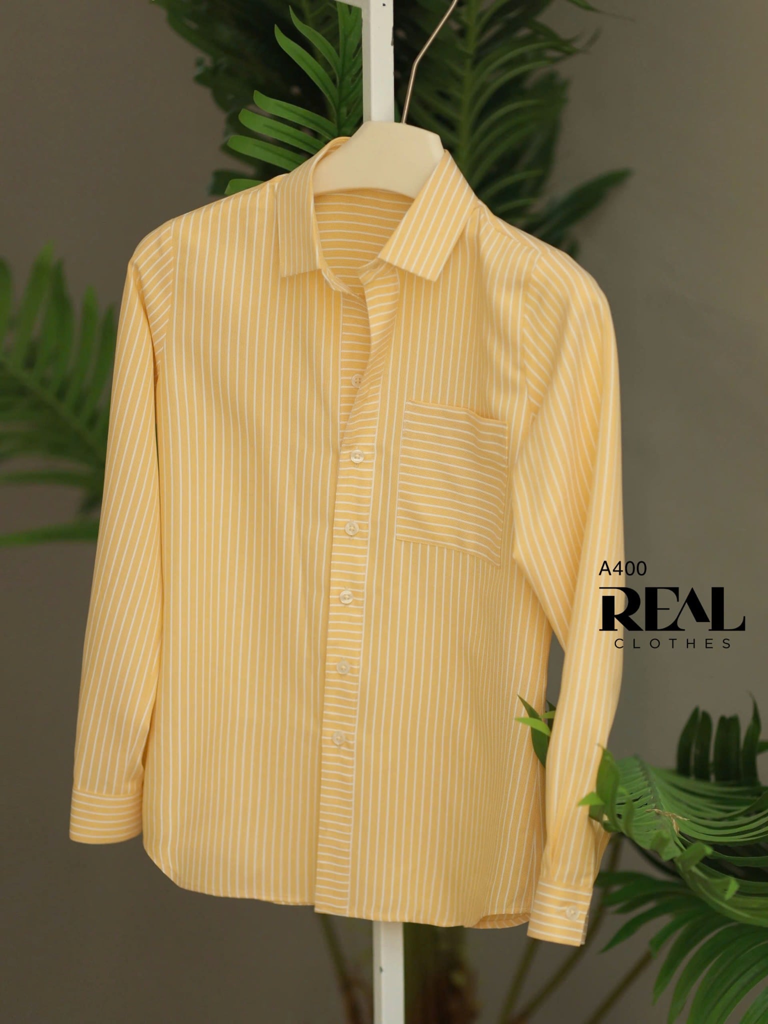 Sơ mi túi sọc vàng