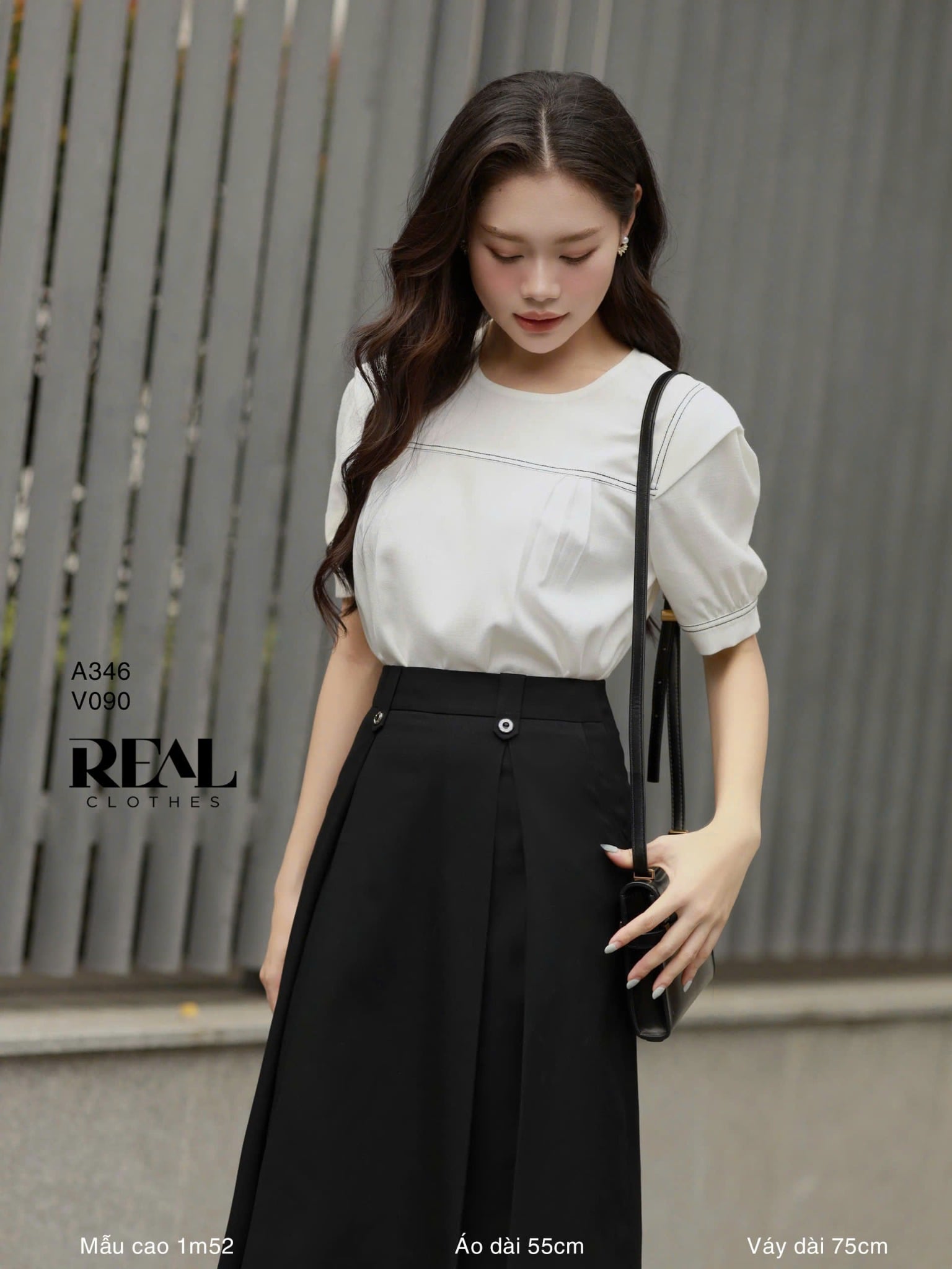 Váy 2 xếp nút đen SALE