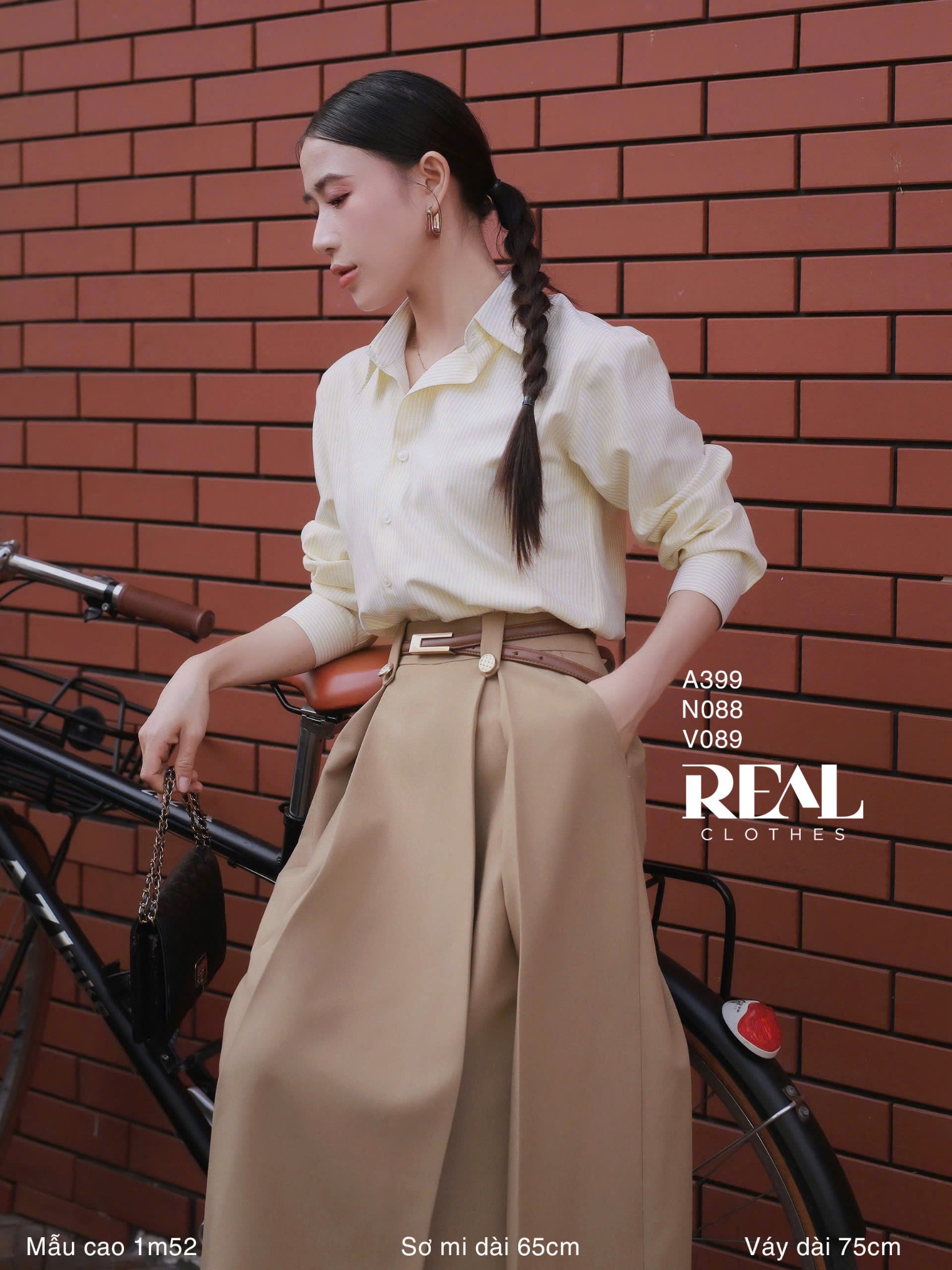 Sơ mi form rộng sọc vàng