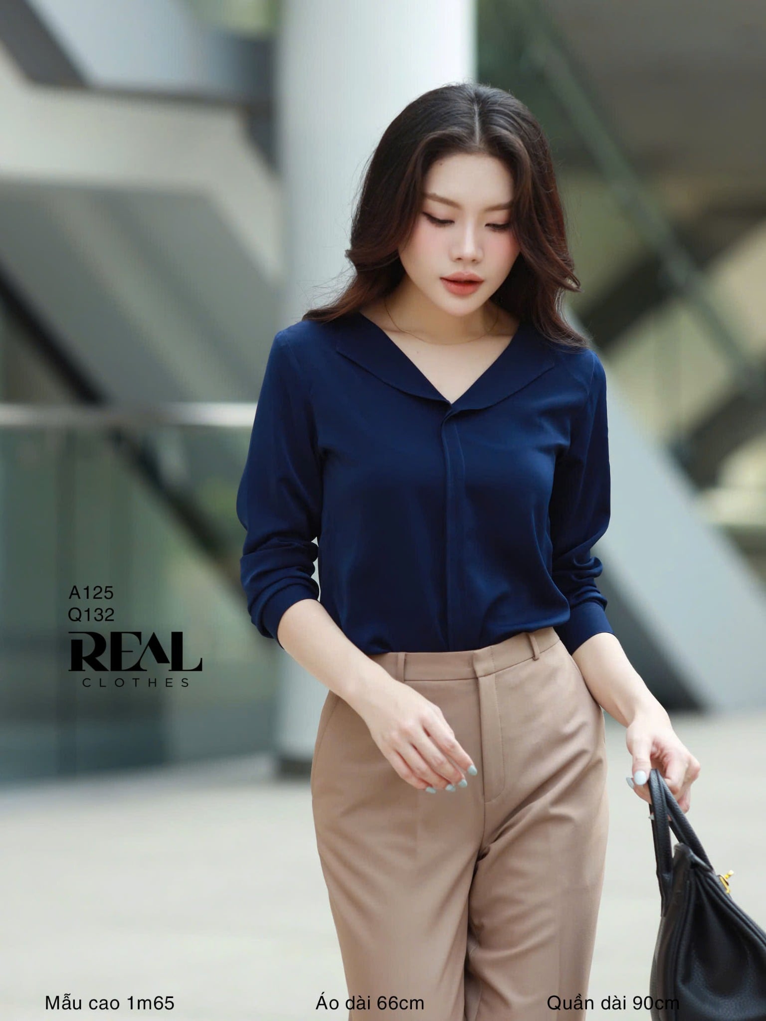 Áo cổ lật xanh đen