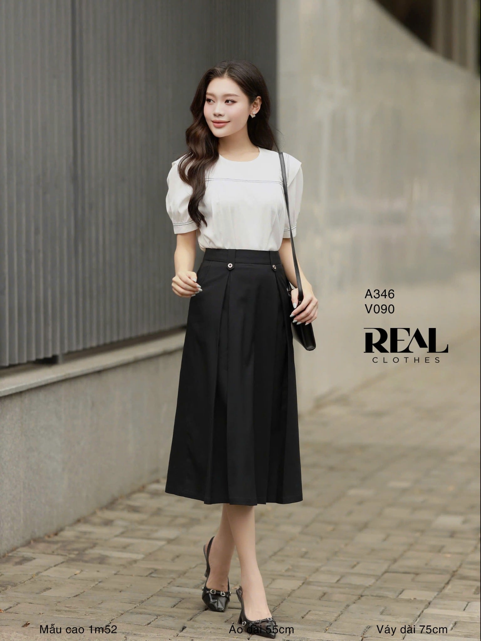 Váy 2 xếp nút đen SALE