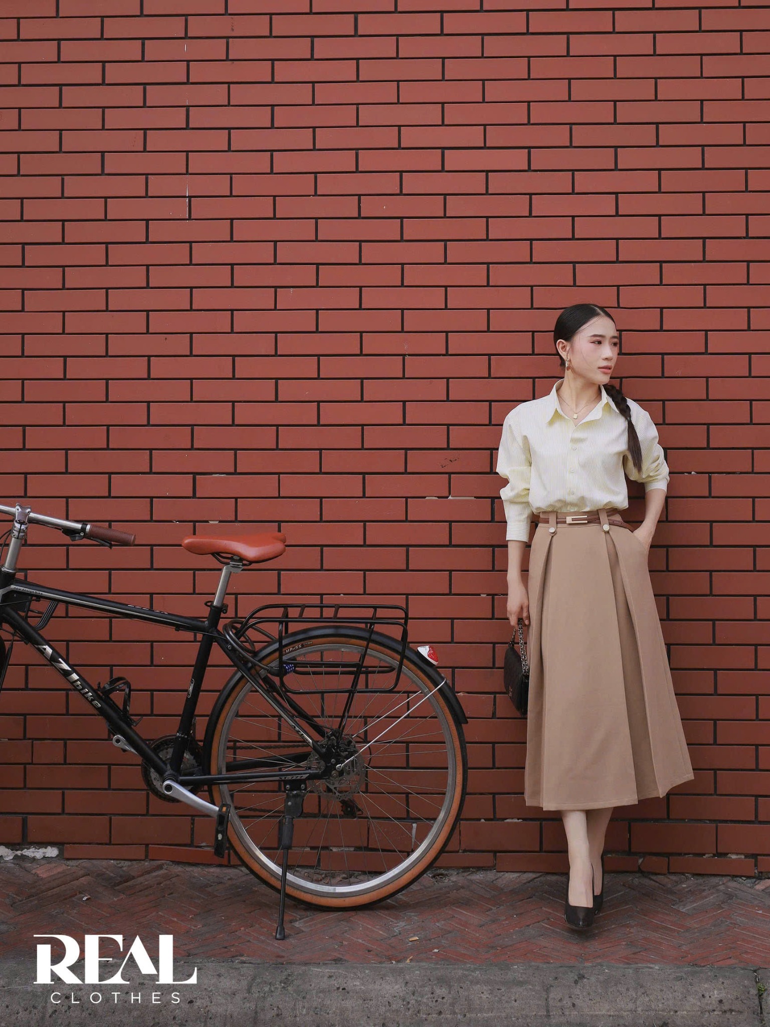 Sơ mi form rộng sọc vàng