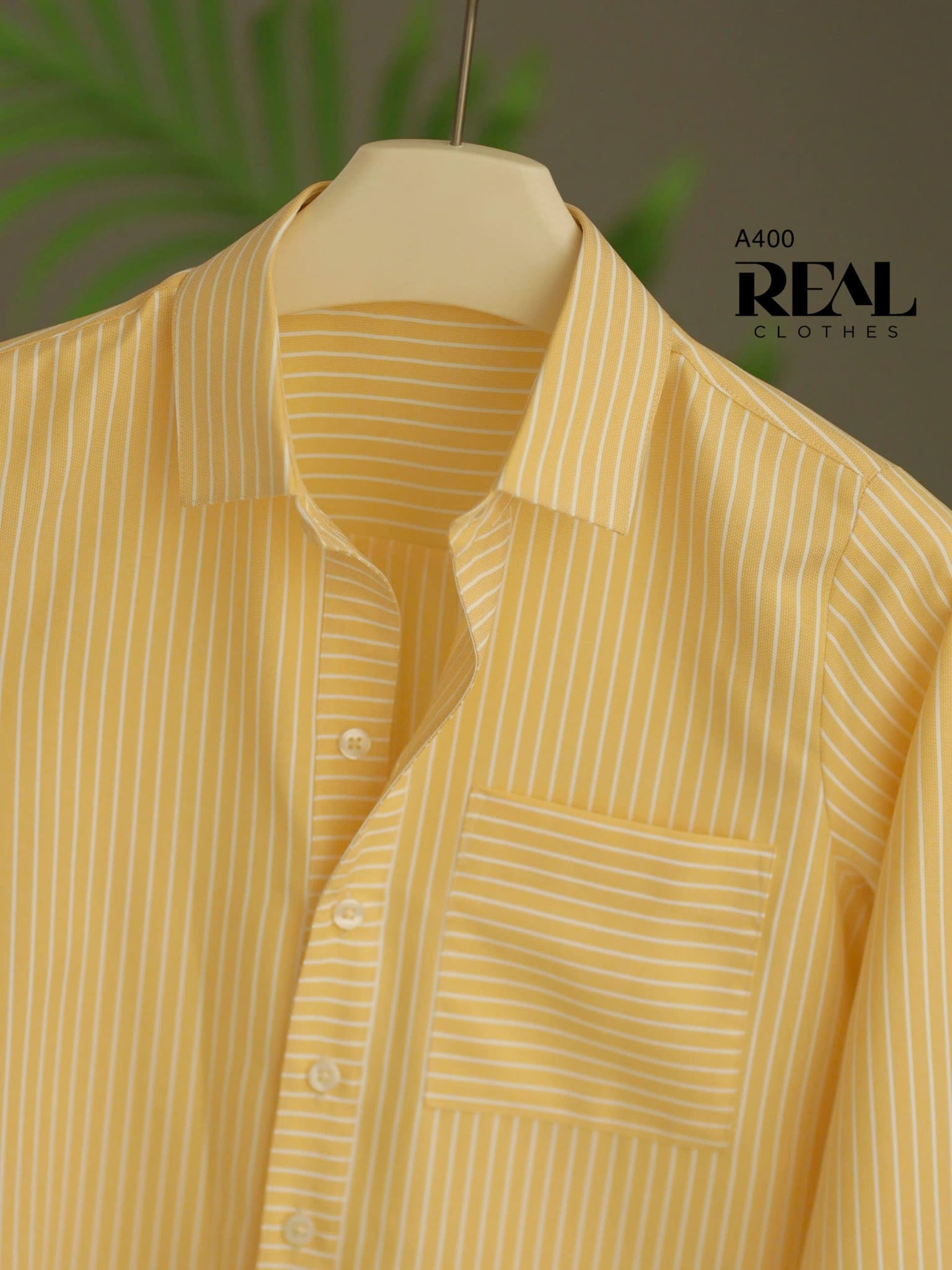 Sơ mi túi sọc vàng