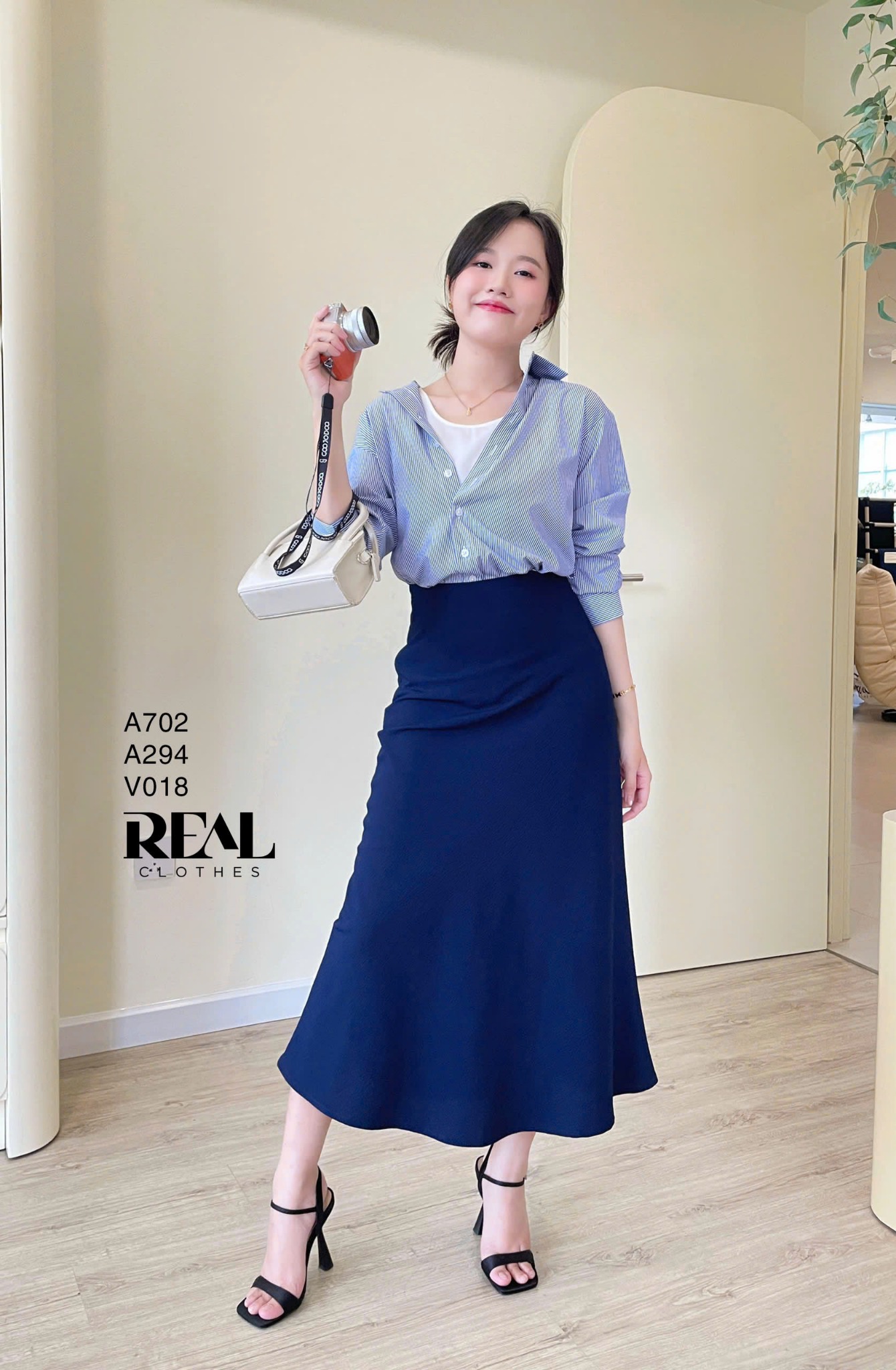 Sơ mi form rộng sọc xanh SALE